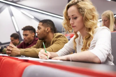 female-student-taking-notes-in-a-university-lectur-2024-10-20-11-07-56-utc female-student-taking-notes-in-a-university-lectur-2024-10-20-11-07-56-utc